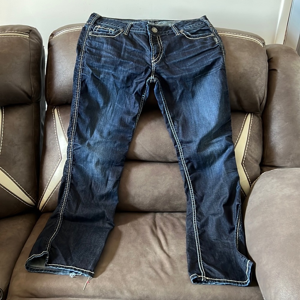Woman’s silver jeans size 33/31